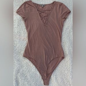 Charlotte Russe Crisscross V Neck Short Sleeve Bodysuit.